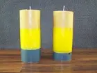 Pair of round cylinder shaped multi color piller candles