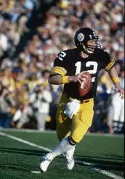 Quarterback Terry Bradshaw Pittsburgh Steelers rolls out to pass a- Old Photo 1