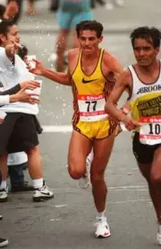 Jose Luis Molina of Costa Rica overtakes Alfredo Vigueras of Mexic- Old Photo