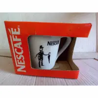 在飛比找蝦皮購物優惠-【雀巢咖啡Nescafe】圖案~拿傘老者、雀巢波浪把手造型精