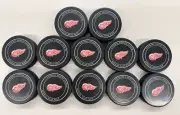 13 Detroit Red Wings Official NHL Game Pucks Sher-Wood Gary Bettman -Canada Made
