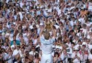 Stefan Edberg of Sweden shows the trophy to the crowd after defeat- Old Photo