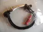Coca Cola bracelet black bottle microphone unused rare