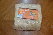 An Unopened Package of Two Straw Bales, Each 2.5" x2.5" x 5".