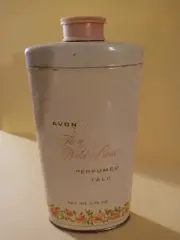 vintage Avon perfumed talc tin with talc To A Wild Rose full