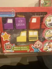 WOW! STUFF - CoComelon Toys Build and Reveal Musical Vehicles, School Bus Fire E