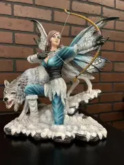 Fairy with Bow (missing arrow) and Wolf Statue