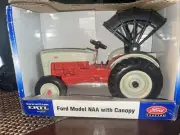 NEW ERTL, FORD MODEL NAA WITH CANOPY 1/16 DIECAST TRACTOR