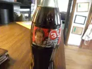 DALE EARNHARDT JR. 1999 COKE BOTTLE UNOPENED FLAWS IN LABLE