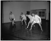 Action playing paddle ball,Emmett O'Neal,Matthew Mennit,James P Richards,1937
