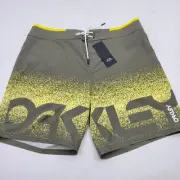 Oakley Men's 34 Dark Brush Pixel Spell Out Performance Fit Board Shorts NWT