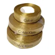 AUTHENTIC Calvin Klei Gift Wrap Ribbon Golden NEW Aprox 75 yards