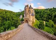 BELECO 10x8ft Fabric Germany Burg Eltz Castle Backdrop Medieval Castle Green Mountain Forest Sunset Scenery German Historic Architecture Background German Travel Portrait Photoshoot Studio Props