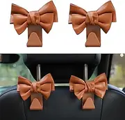 UOEPOWA 2 Pcs Car Back Seat Headrest Hooks, Elegant Stylish Leather Bow Car Hangers, Universal Rear Car Seat Storage Hook, Auto Interior Accessories for Handbag Purse Coat (Brown)