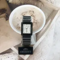在飛比找Yahoo!奇摩拍賣優惠-「官方授權」ORIENT東方錶 女 中型黑陶瓷白面 石英腕錶