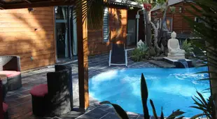 Lodge Le Palissandre a LA LIANE DE JADE 974- jacuzzi privatif - piscine