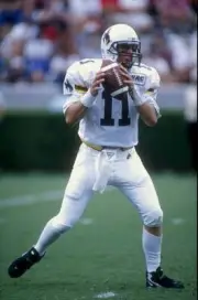 Quarterback Jay Stoner of the Wyoming Cowboys drops back 1998 Old Photo