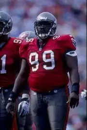 Warren Sapp of the Tampa Bay Buccaneers looks on 1997 Old Photo