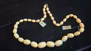 NOS Laguna For Tempo Cream graduated Lucite Bead Vintage 24” Long Necklace NEW