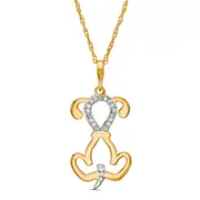 0.05 CT. T.W. Natural Diamond Laser-Cut Dog Pendant in 10K Yellow Gold