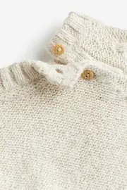 Cable-knit jumper