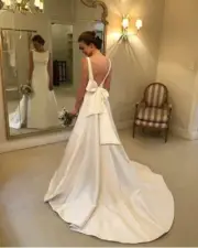 A-line Jewel Backless Chapel Train Satin Wedding Dress