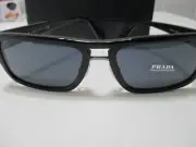 Prada black frame sunglasses. SPR 05V 1AB-0A9 56-18-145