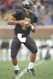 Quarterback Corby Jones Missouri Tigers prepares to pass the footb- Old Photo
