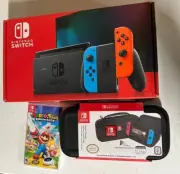 Nintendo Switch 32GB Gray Joy‑Con W/Mario + Rabbids: Kingdom Battle and Case