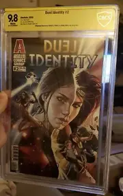DUEL IDENTITY #2 CBCS 9.8 2x Signed By Benny And Jenna Powell