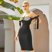 在飛比找ETMall東森購物網優惠-2021年新款黑色吊帶縫鉆修身顯瘦繃帶裙面料氣質魅力交際派對