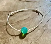 Emerald Green Uranium Glass 10mm Cord Bracelet - Glows Under Blacklight