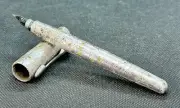 MUONIONALUSTA METEORITE PEN WITH FACETED DEMANTOID GARNET STONES
