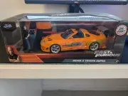 Fast And Furious 1995 Toyota Supra With Brian Orange Jada 1:24 Diecast Car Model