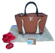 LOUIS VUITTON Lockmeto Brown Caramel Black and White Leather Tassel Tote Bag