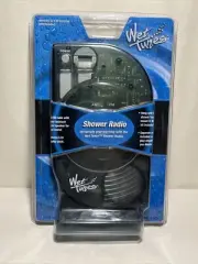 SALTON 2001 WET TUNES SHOWER AM / FM RADIO LCD CLOCK DISPLAY.