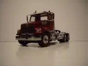 DIECAST MASTER 1/50 METALLIC RED WESTERN STAR 4700 SF TRACTOR DAYCAB FIRST GEAR
