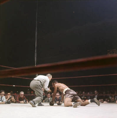 Zora Folley tries to get up after being knocked down by Muhammad A- Old Photo