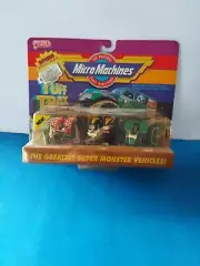 NEW MICRO MACHINES 7414 TUFF TRAX COLLECTION #4 GREATEST SUPER MONSTERS! (PEACH)