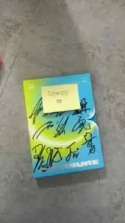 Autographed album by all Treasure members