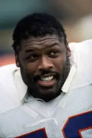 Offensive lineman Ken Lanier Denver Broncos looks on from the side- Old Photo