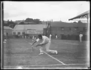 Tennis player Rupert Wertheim ready to hit a backhand shot at the - Old Photo