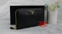 在飛比找Yahoo!奇摩拍賣優惠-優買二手精品名牌店 PRADA 1M0506 黑 全皮 金色