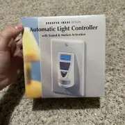 BRAND NEW SEALED Sharper Image Automatic Light Controller Sound & Motion Si648