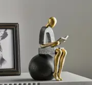 Abstract Golden Thinker Reading Statue