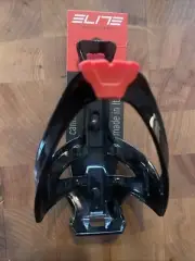 New-Old-Stock ELITE CANNIBAL XC Water Bottle Cage • Black with Red. (AL)