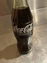 collectible Unopened 237ml Coca Cola Bottle