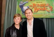 Actor Haley Joel Osment director Steve Trenbirth at the premiere o- Old Photo