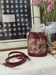 coach Mini Bucket Bag In Signature Canvas With Cherry Print cy738