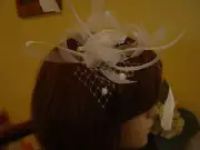 IVORY MESH ,HAIL SPOT NETTING and FEATHER FASCINATOR - CLIP